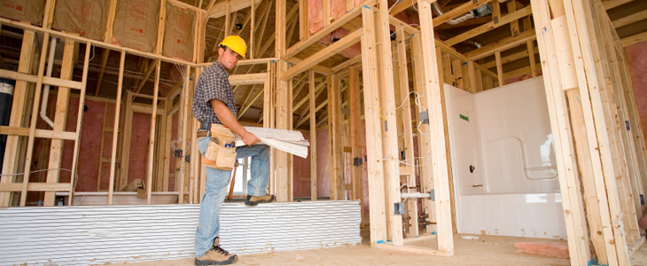 man inside a building frame